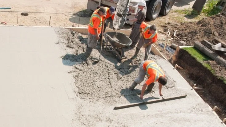 Professional concrete crew working on installation project